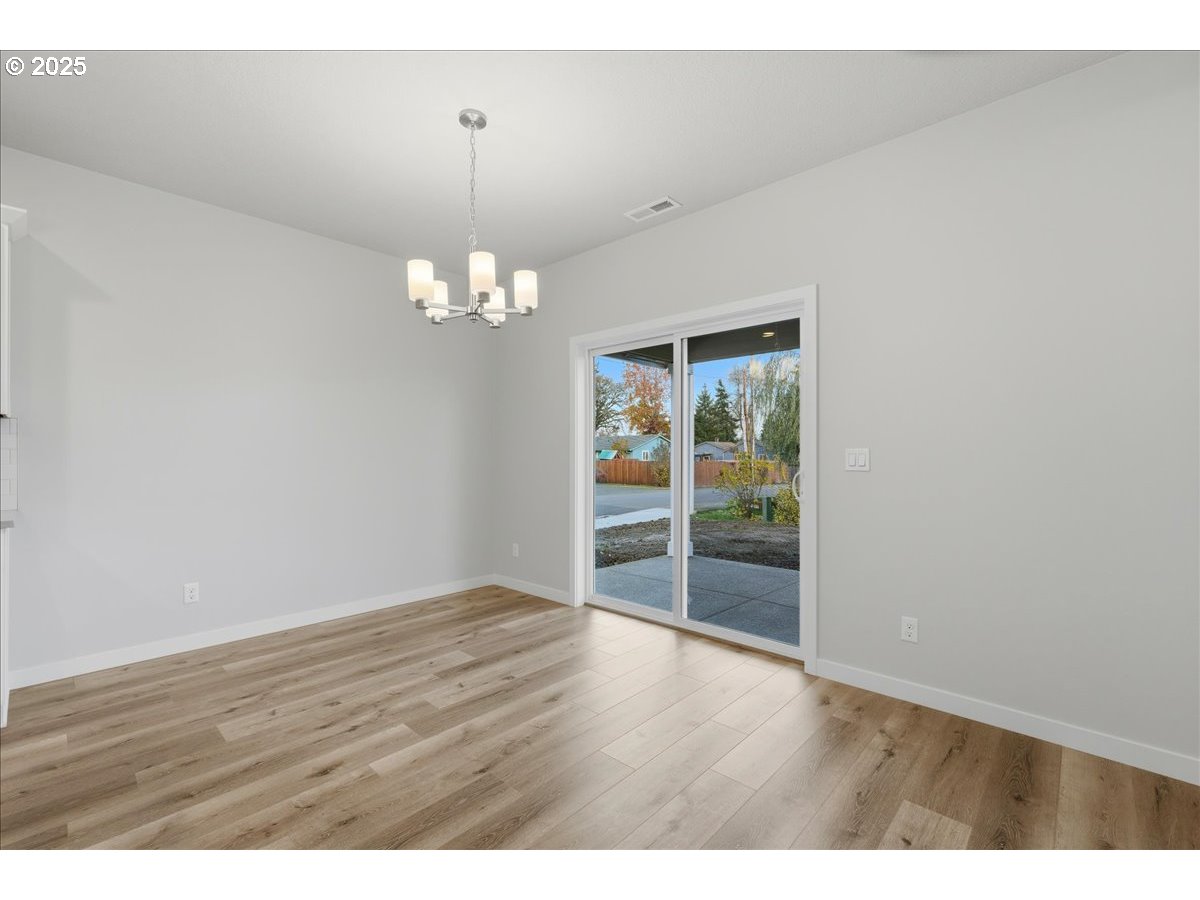 405 South Cedar Street Yamhill, OR 97148 - Photo 7 of 36 a view of a room with wooden floor