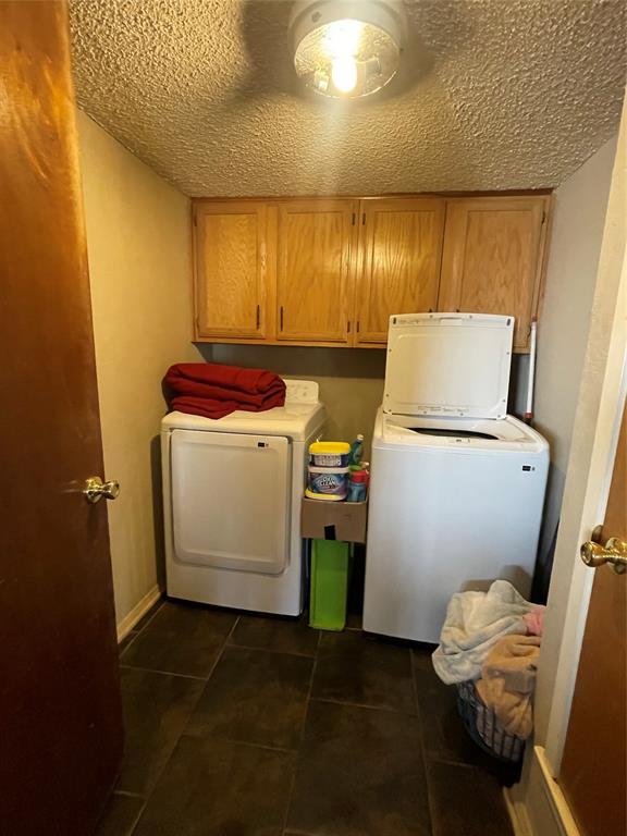 814 Plum Street Graham, TX 76450 - Photo 15 of 25 a utility room with dryer and washer