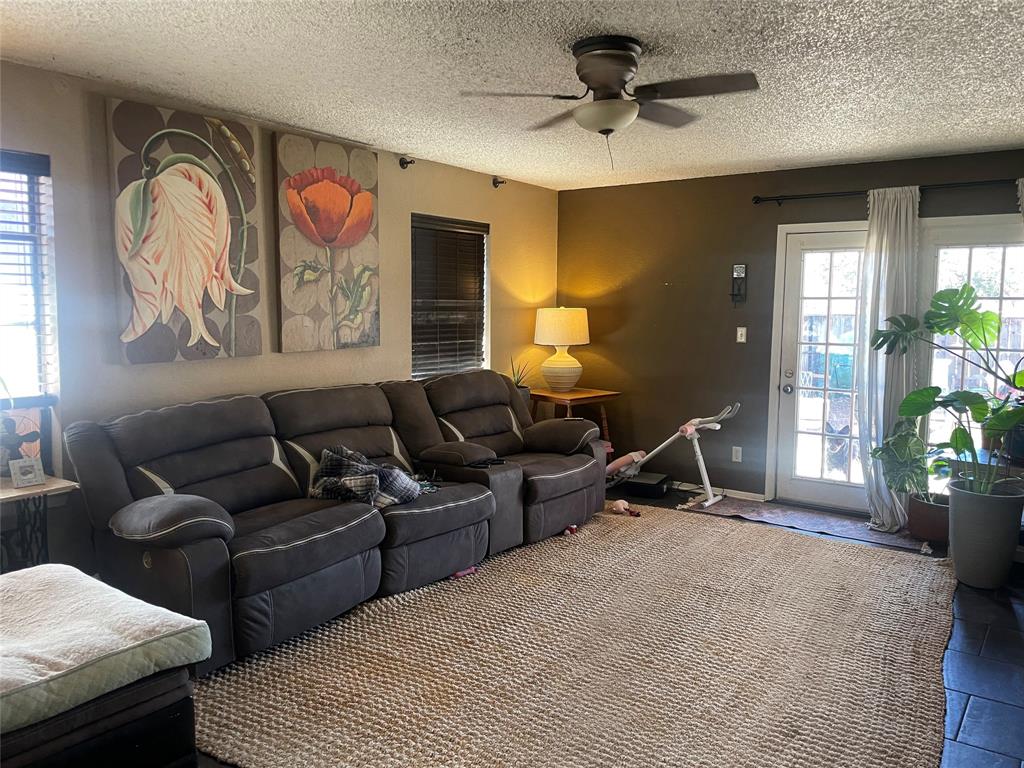 814 Plum Street Graham, TX 76450 - Photo 19 of 25 a living room with furniture and window
