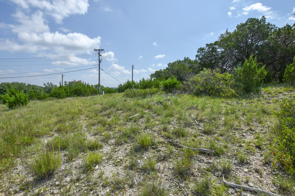 Tbd Lime Creek Road Leander, TX 78641 - Photo 16 of 17 a view of a field of grass and trees
