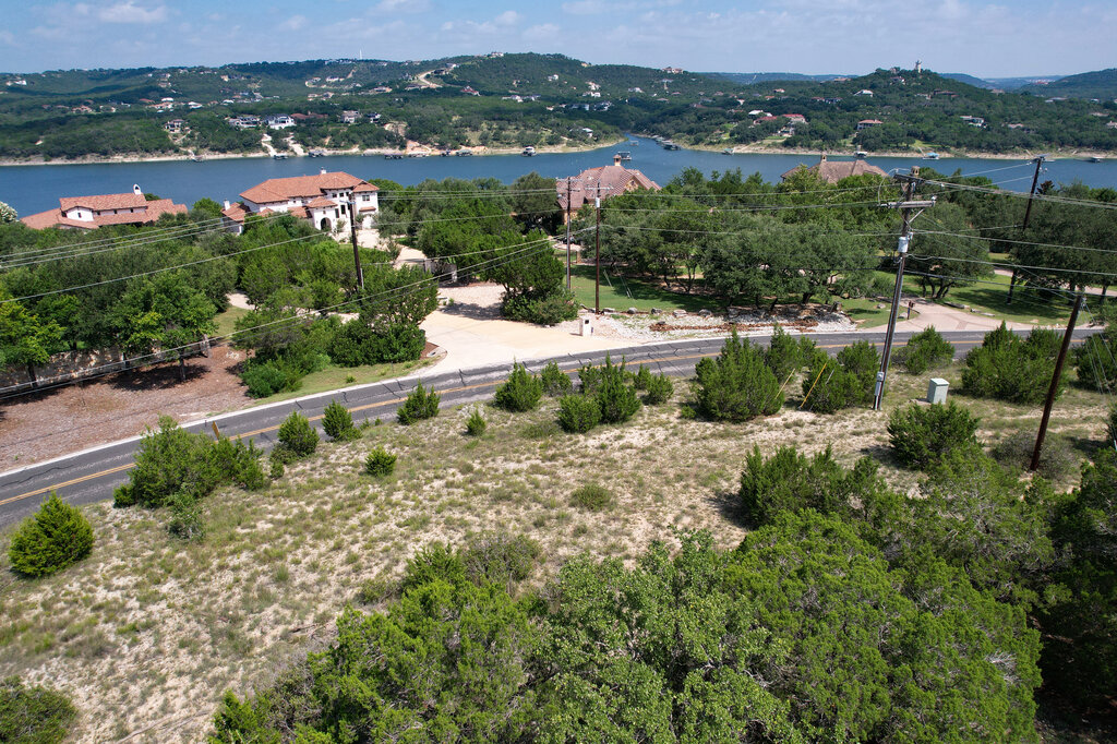 Tbd Lime Creek Road Leander, TX 78641 - Photo 6 of 17 an aerial view of lake with residential house and ocean view