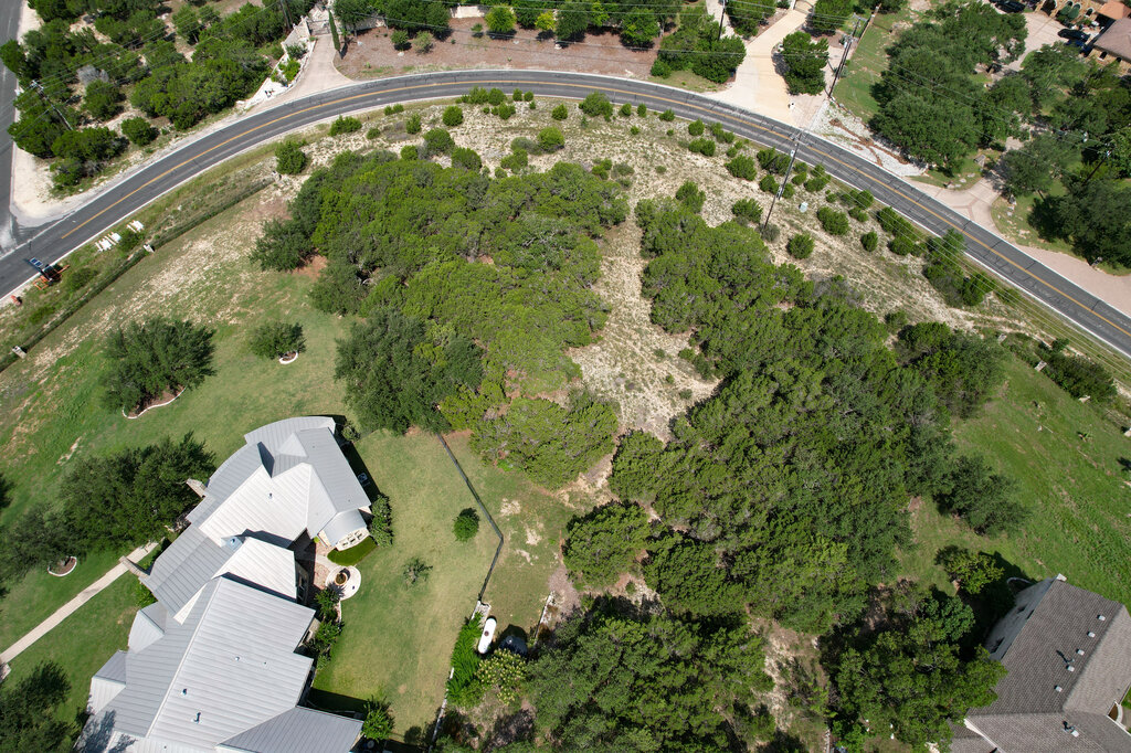 Tbd Lime Creek Road Leander, TX 78641 - Photo 9 of 17 an aerial view of a swimming pool with a yard and plants