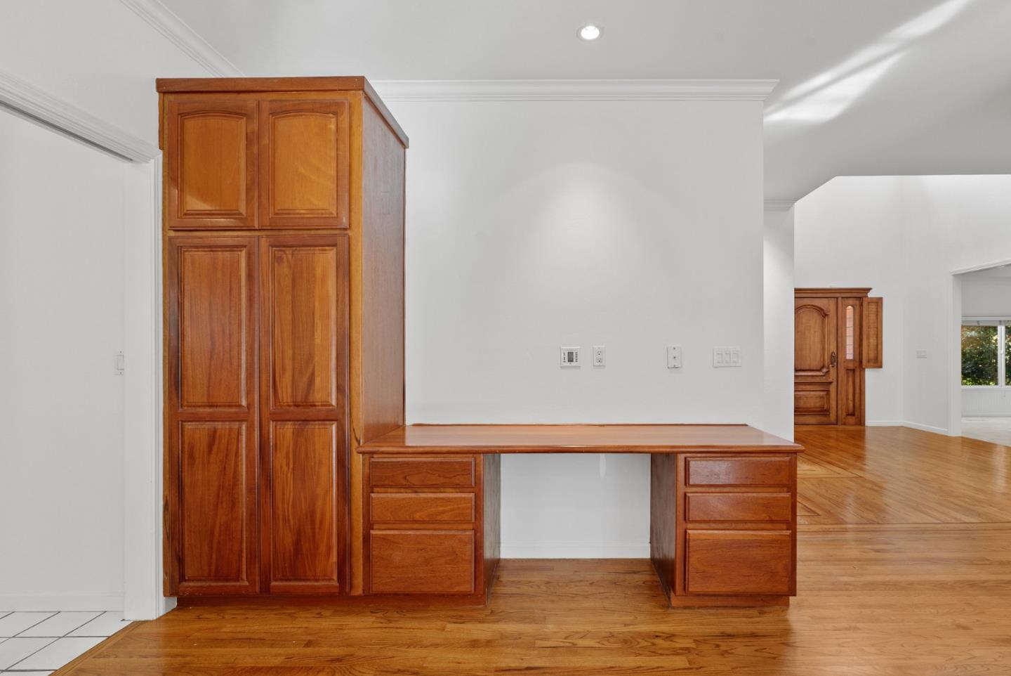 210 Moore Creek Road Santa Cruz, CA 95060 - Photo 13 of 63 an empty room with wooden floor closet and windows