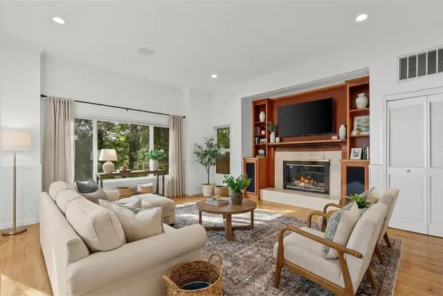 a view of empty room with large windows