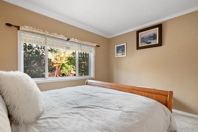 a bathroom with a sink mirror and vanity
