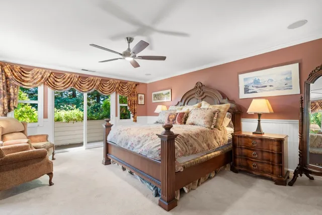 a bathroom with a sink a large mirror and a bathtub