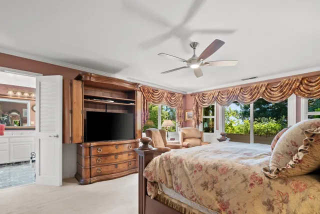 a bathroom with a double vanity sink and a large mirror