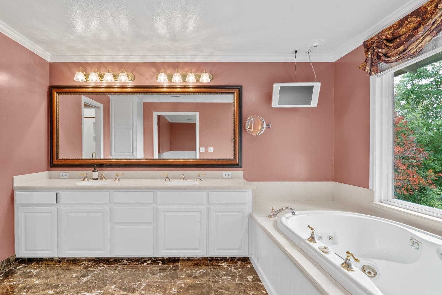 210 Moore Creek Road Santa Cruz, CA 95060 - Photo 32 of 63 a bathroom with a tub sink and mirror