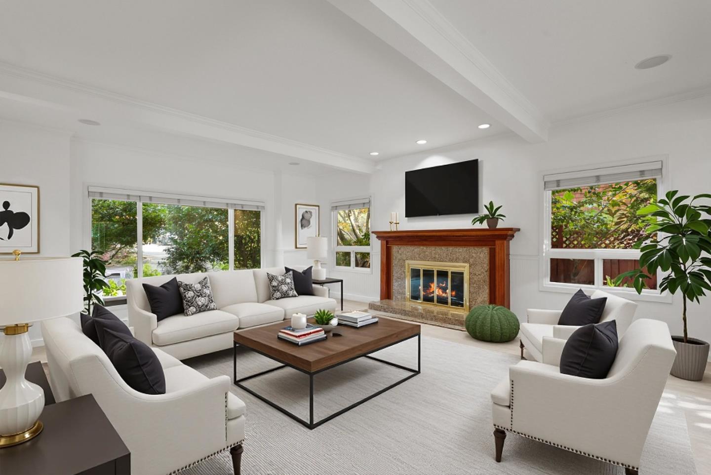 210 Moore Creek Road Santa Cruz, CA 95060 - Photo 4 of 63 a living room with furniture a fireplace a large window and a flat screen tv