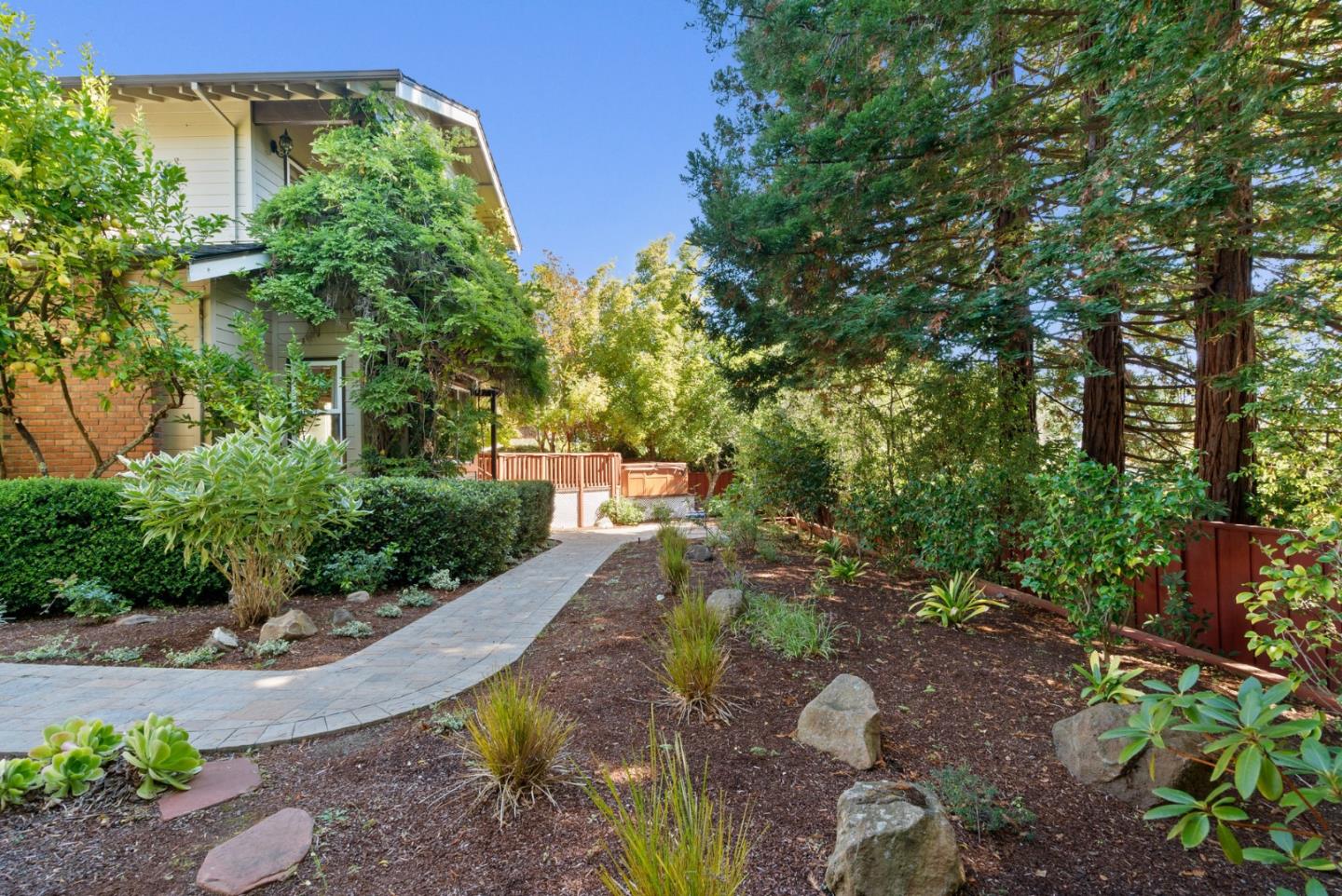 210 Moore Creek Road Santa Cruz, CA 95060 - Photo 52 of 63 a view of a garden with large trees