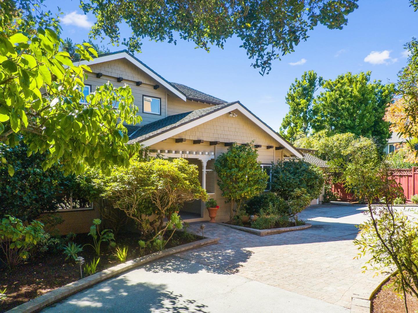 210 Moore Creek Road Santa Cruz, CA 95060 - Photo 55 of 63 a front view of a house with a yard and potted plants