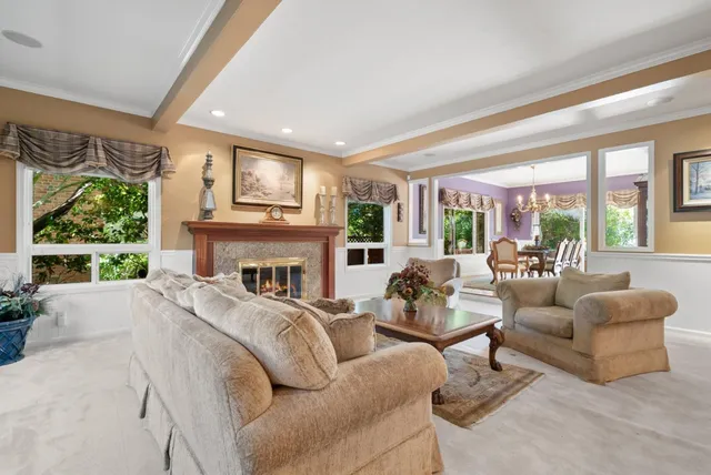 a view of a livingroom with furniture window and outside view