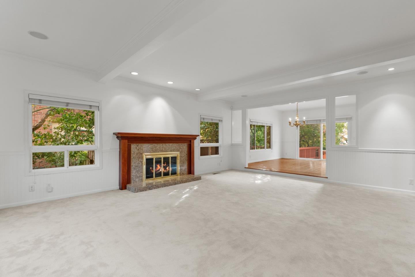 210 Moore Creek Road Santa Cruz, CA 95060 - Photo 6 of 63 an empty room with windows and fireplace