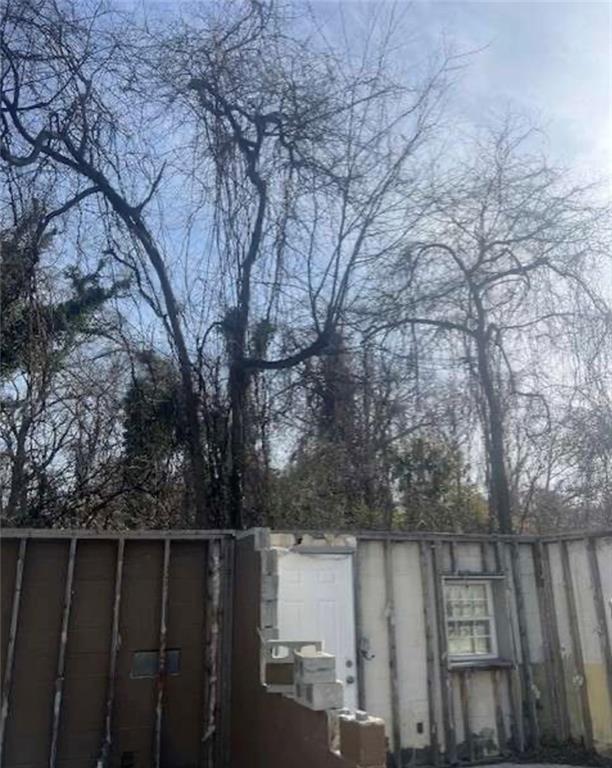 2025 Moody Drive Southwest Atlanta, GA 30315 - Photo 2 of 6 a view of balcony with wooden floor and fence