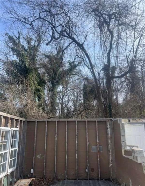 2025 Moody Drive Southwest Atlanta, GA 30315 - Photo 3 of 6 a wooden fence