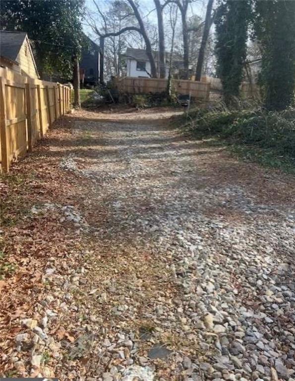 2025 Moody Drive Southwest Atlanta, GA 30315 - Photo 4 of 6 a view of road with large trees