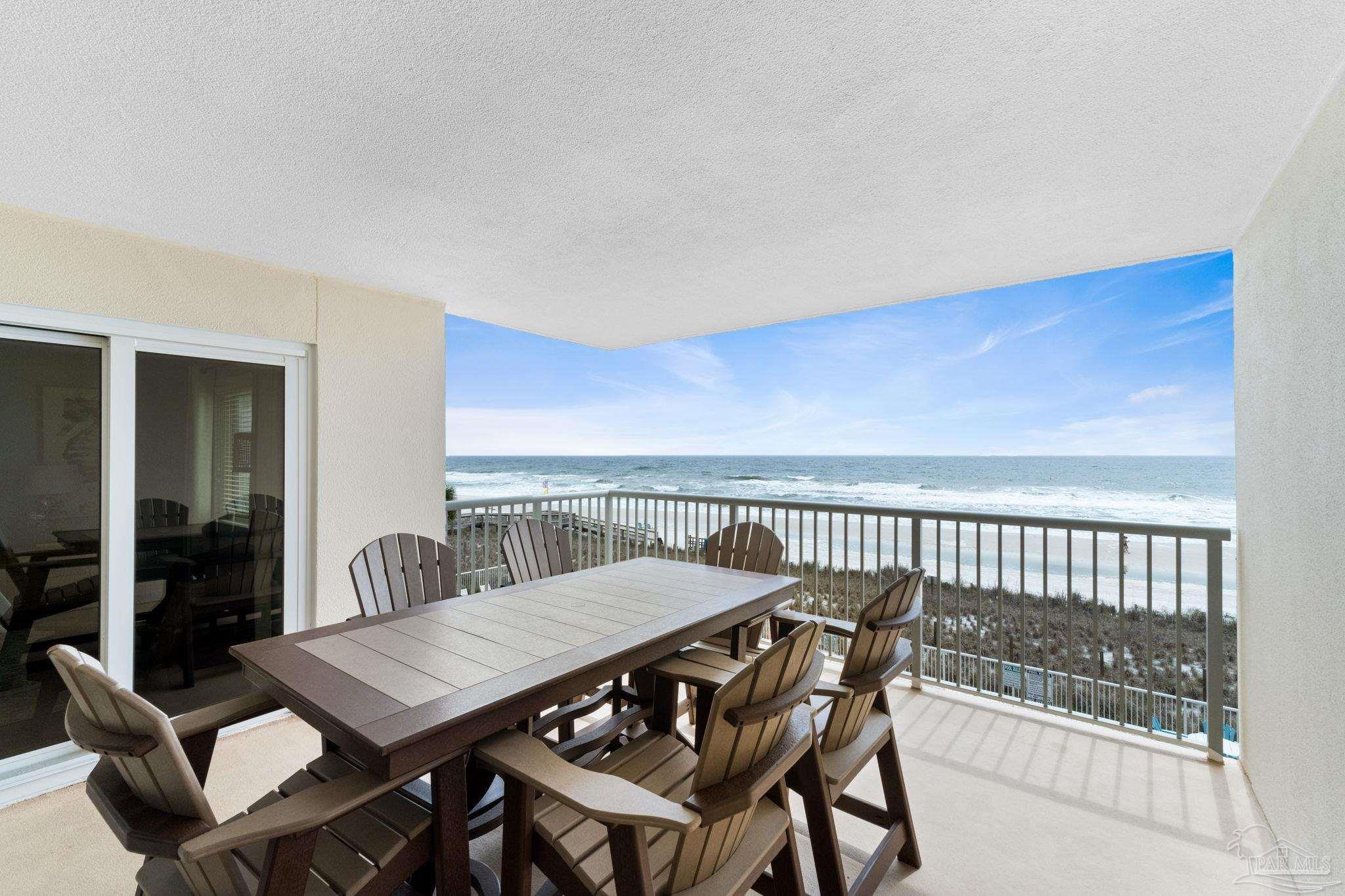 13575 Sandy Key Drive, Unit 335 Pensacola, FL 32507 - Photo 4 of 25 a view of a roof deck with furniture