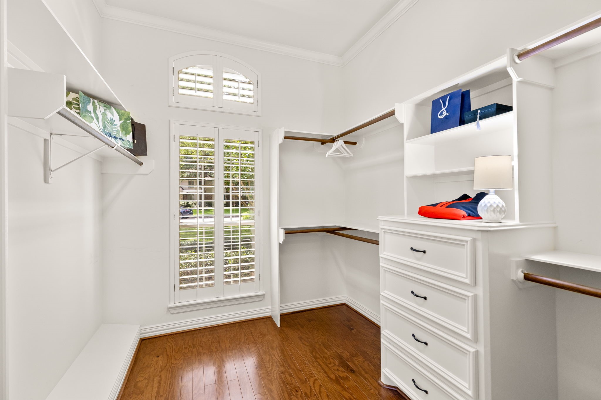 6610 Radley Drive Spring, TX 77379 - Photo 27 of 50 2nd walk-in closet. Notice hardwood floors, crown molding and window transom. Details thru-out every room.