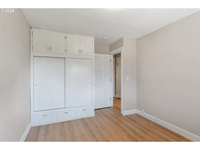 a workspace with furniture and a window