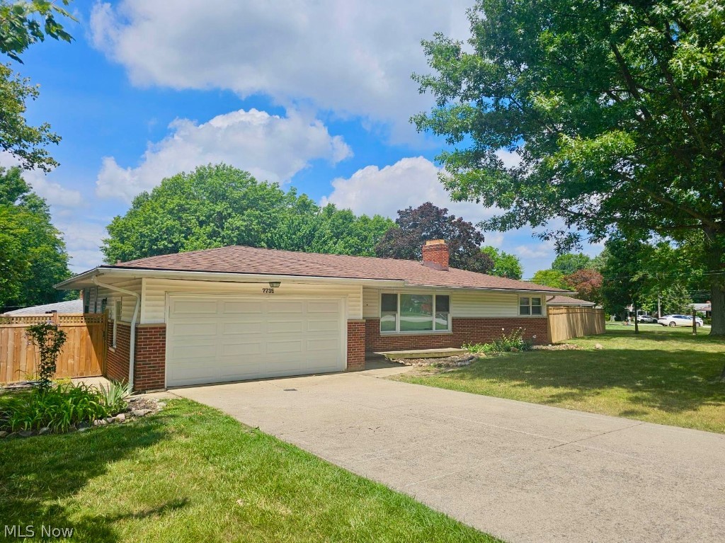 7735 Ragall Parkway Cleveland, OH 44130 - Photo 2 of 32 Ranch-style home with a garage and a front lawn