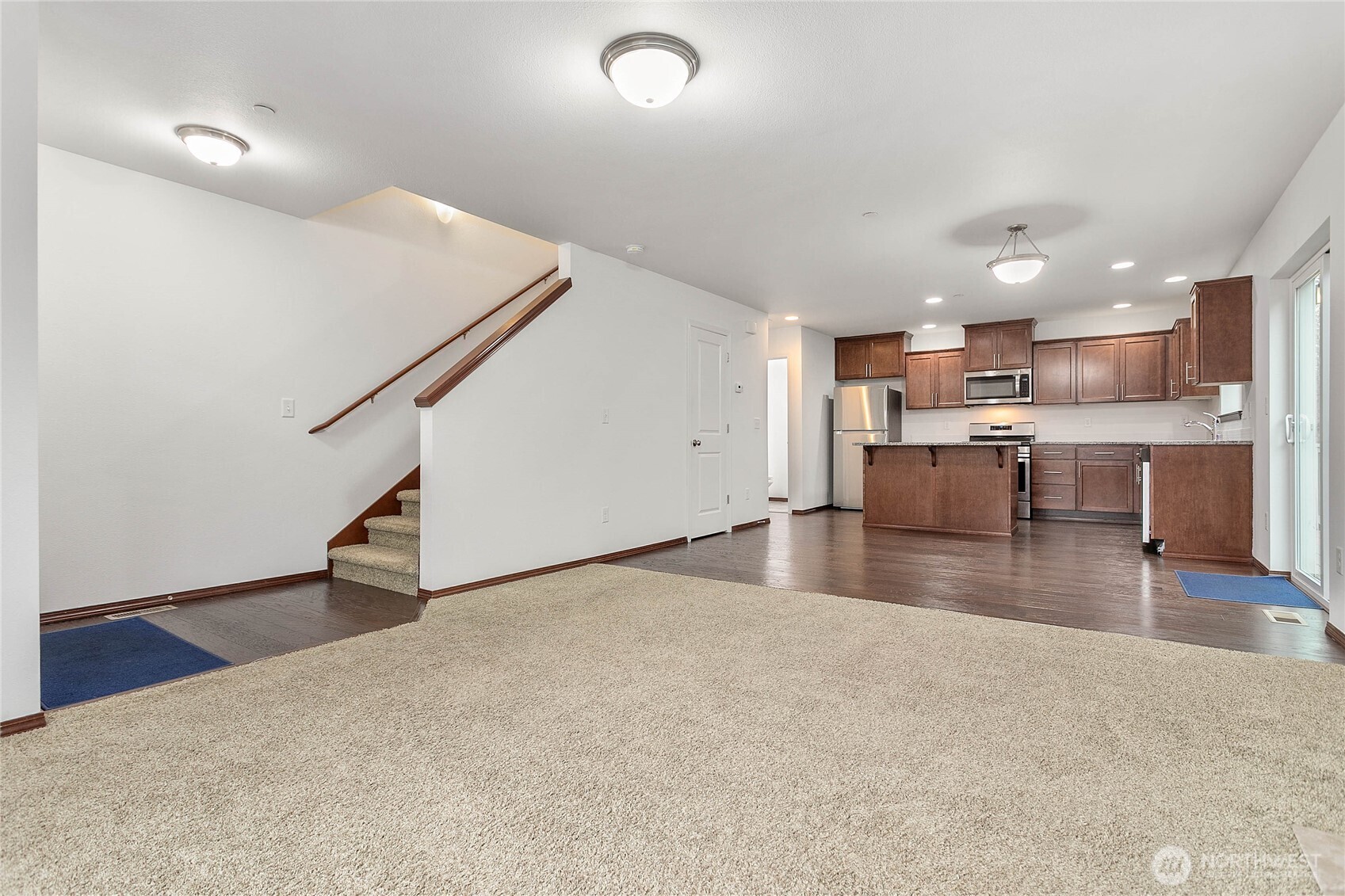 4305 Sumac Lane Bellingham, WA 98226 - Photo 20 of 38 a view of kitchen and dining room with wooden floor