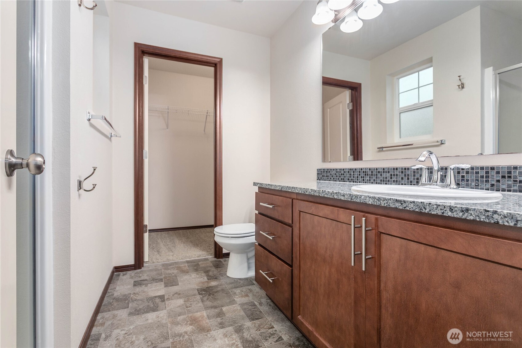 4305 Sumac Lane Bellingham, WA 98226 - Photo 29 of 38 a bathroom with a granite countertop sink toilet and shower