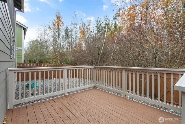 a view of balcony with wooden floor