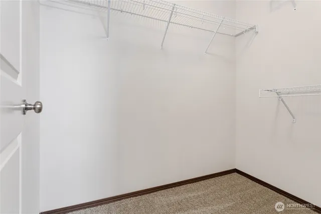 a view of balcony with wooden floor and fence