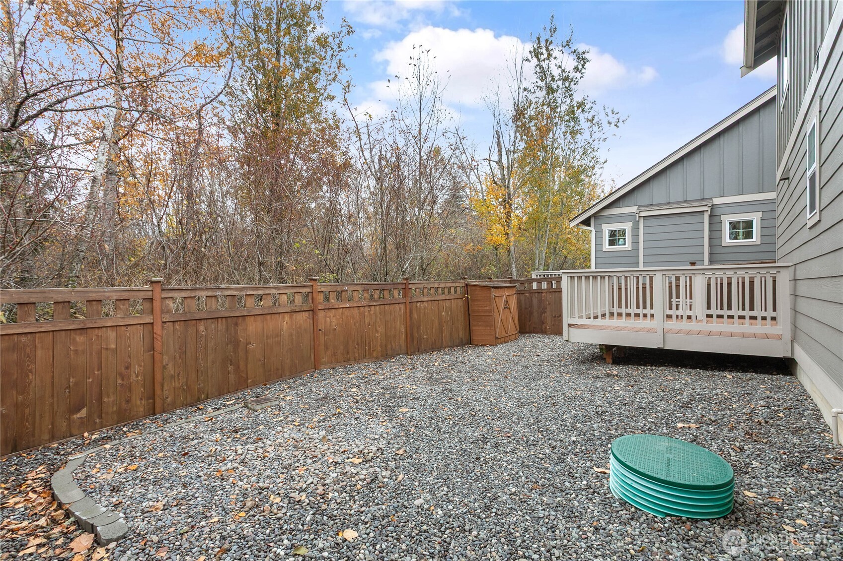 4305 Sumac Lane Bellingham, WA 98226 - Photo 36 of 38 a view of a backyard with wooden fence