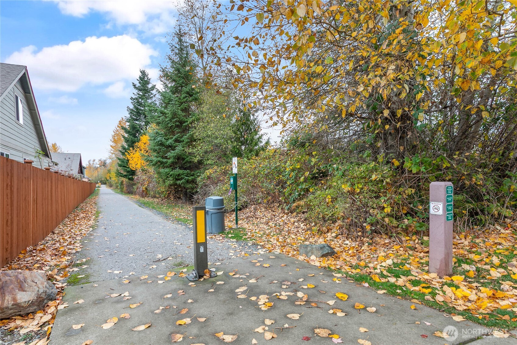 4305 Sumac Lane Bellingham, WA 98226 - Photo 37 of 38 a street view with tall trees