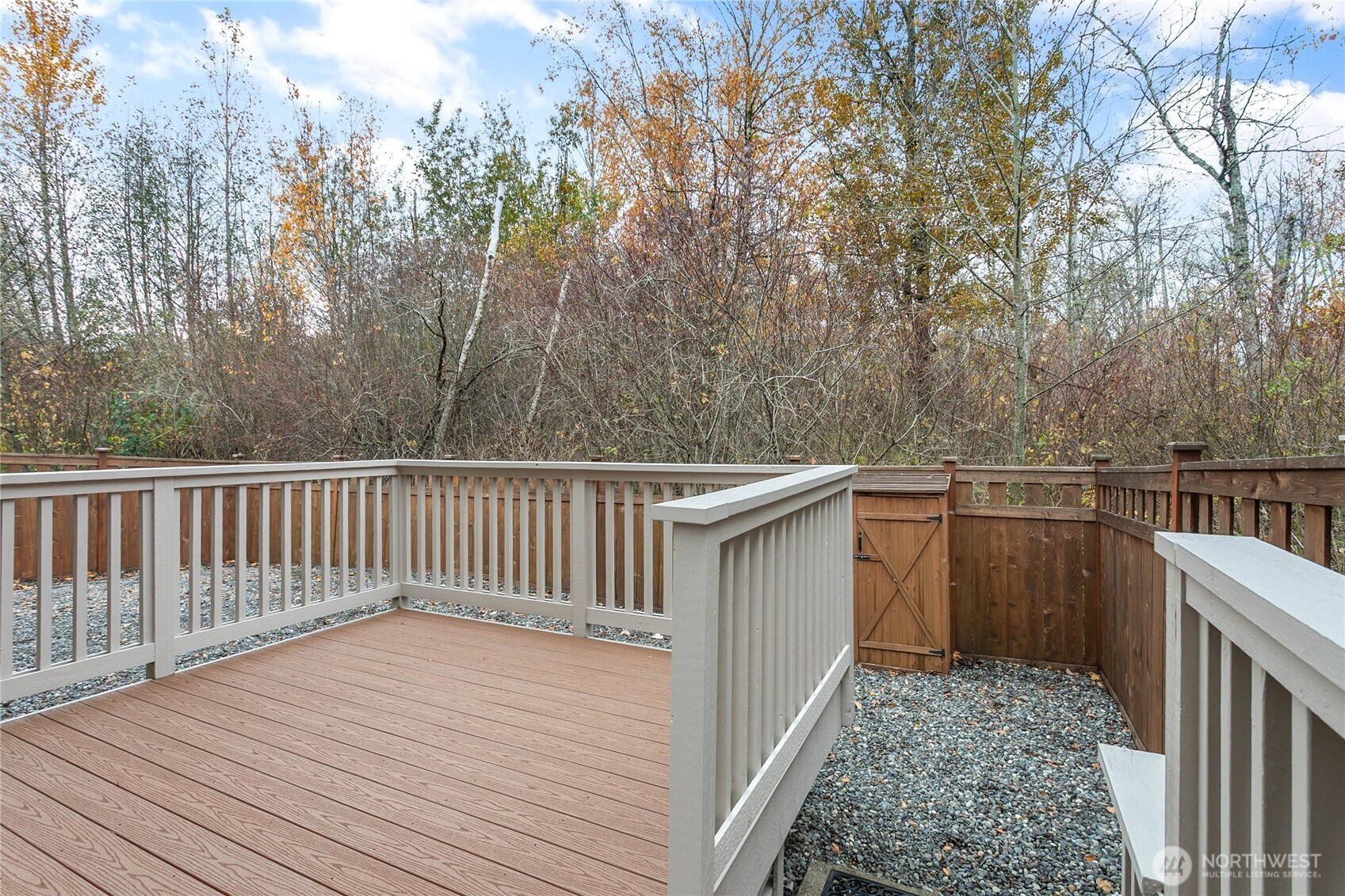 4305 Sumac Lane Bellingham, WA 98226 - Photo 4 of 38 a balcony with wooden floor and fence