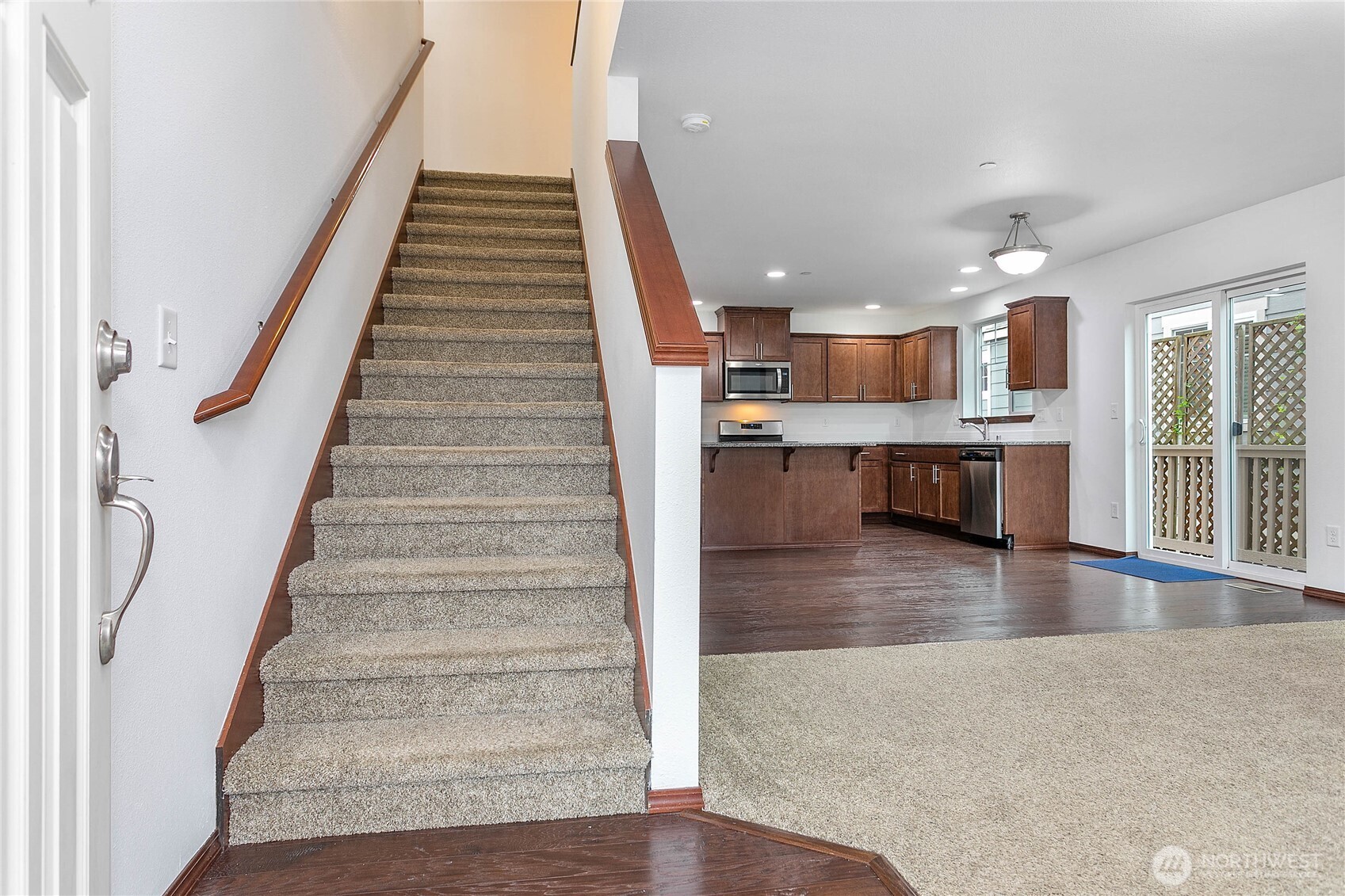 4305 Sumac Lane Bellingham, WA 98226 - Photo 5 of 38 a view of kitchen and dining room with wooden floor