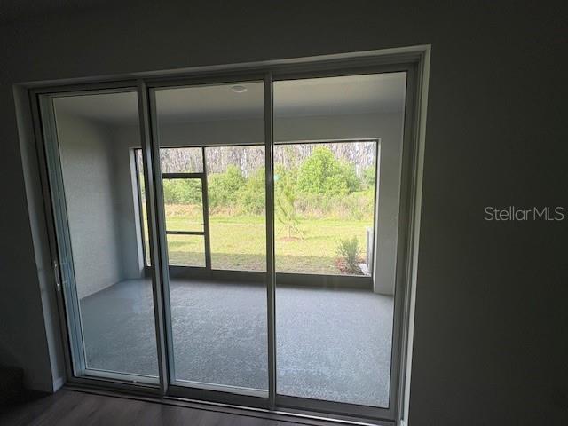 32547 Welling Blade Loop Wesley Chapel, FL 33545 - Photo 20 of 21 a view of an empty room with a window