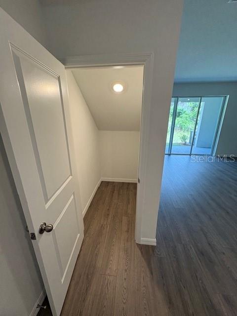 32547 Welling Blade Loop Wesley Chapel, FL 33545 - Photo 6 of 21 wooden floor in an empty room with a window