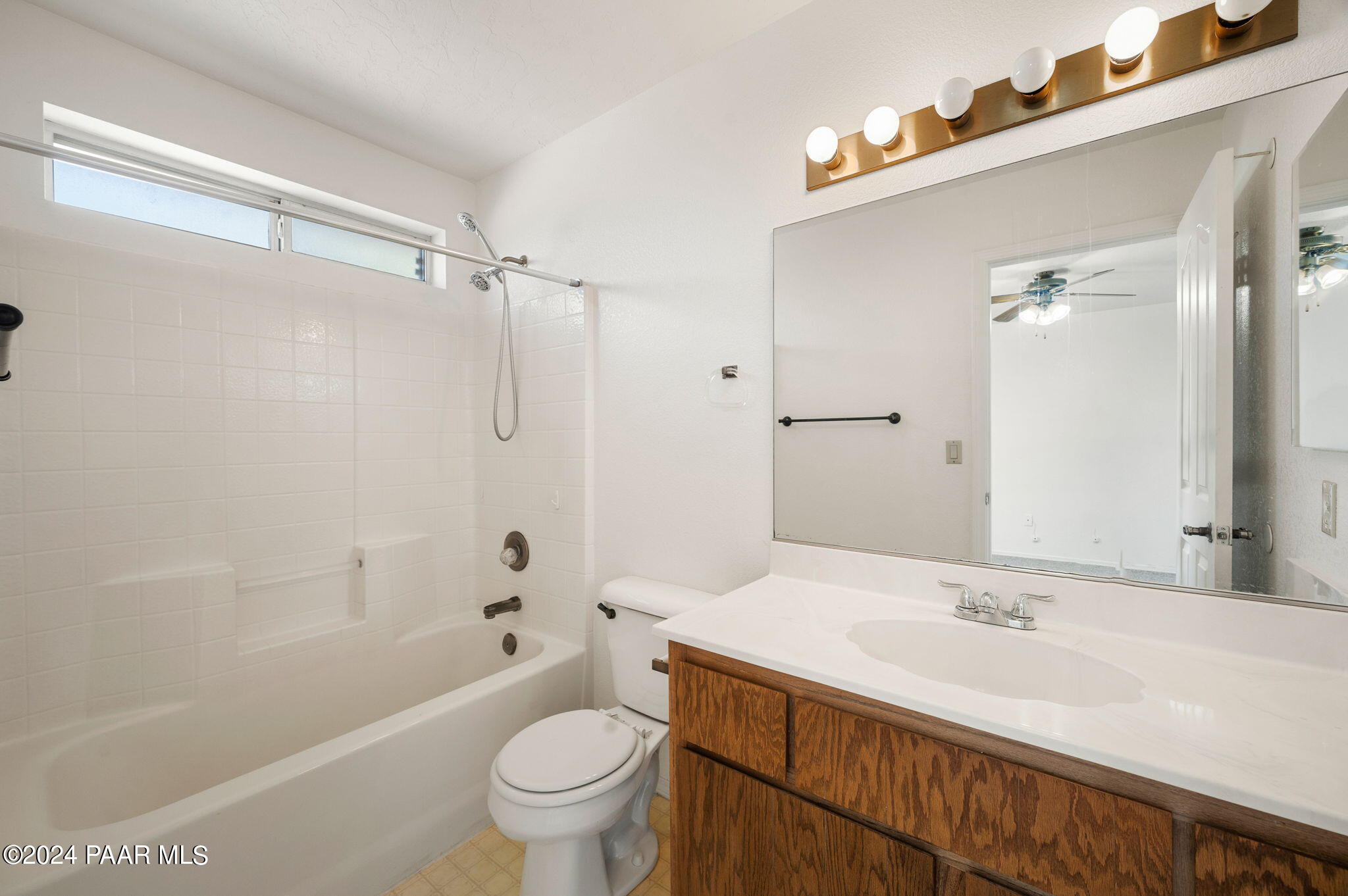 8128 East Gale Road Prescott Valley, AZ 86314 - Photo 21 of 38 a bathroom with a sink a toilet and a bathtub