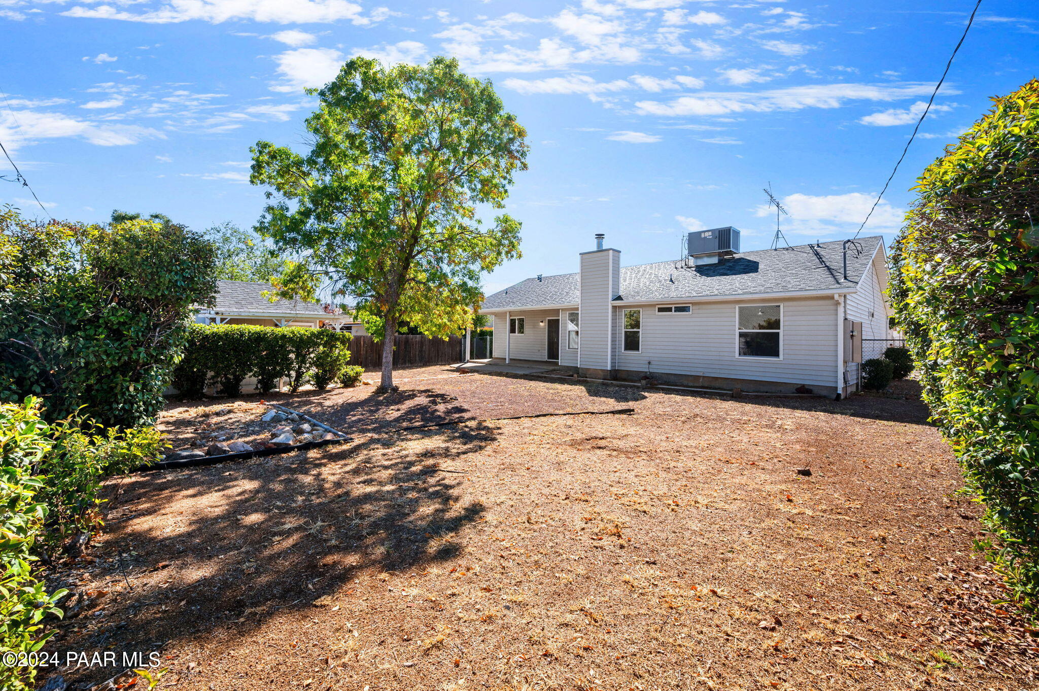 8128 East Gale Road Prescott Valley, AZ 86314 - Photo 27 of 38 a front view of a house with a yard