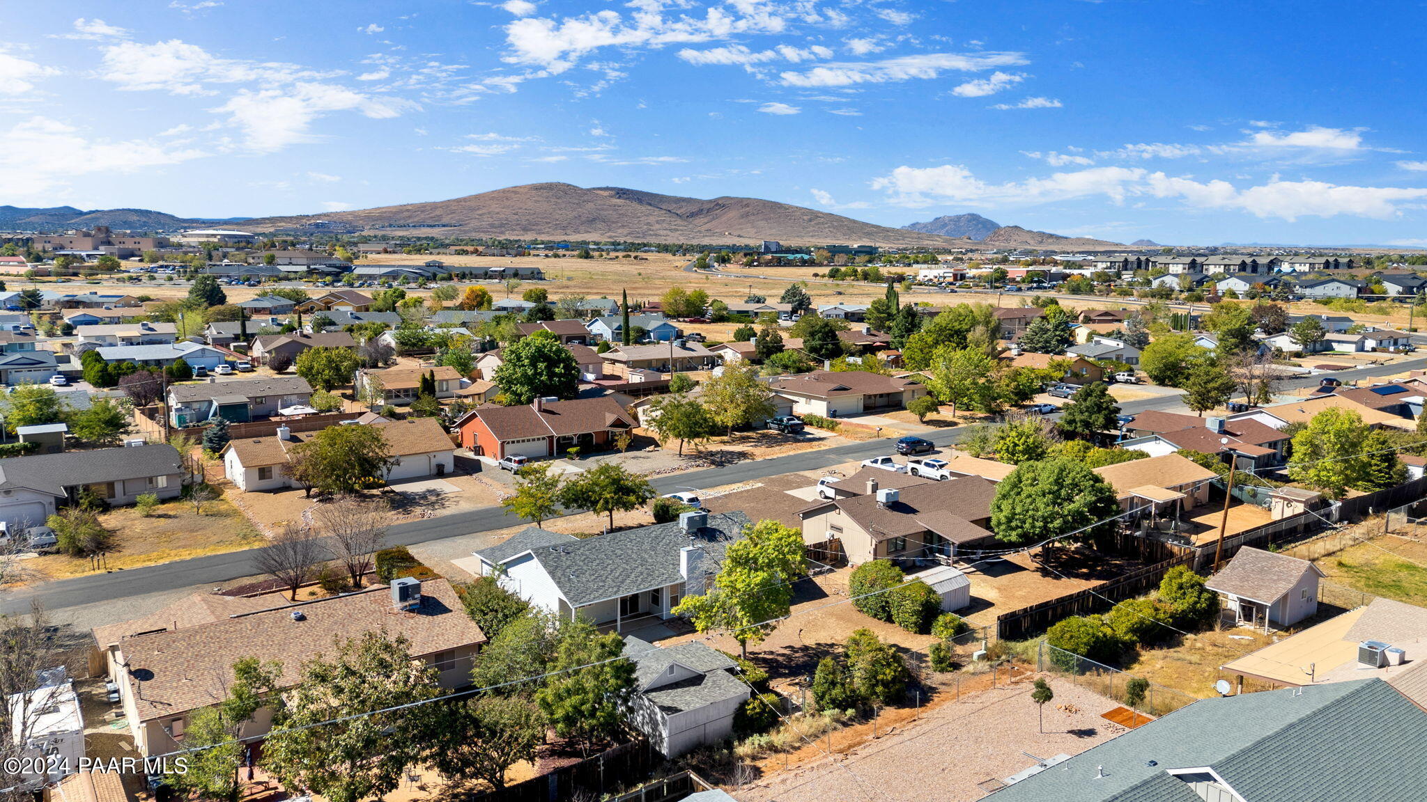 8128 East Gale Road Prescott Valley, AZ 86314 - Photo 36 of 38 an aerial view of a city with lots of residential buildings and mountain view in back