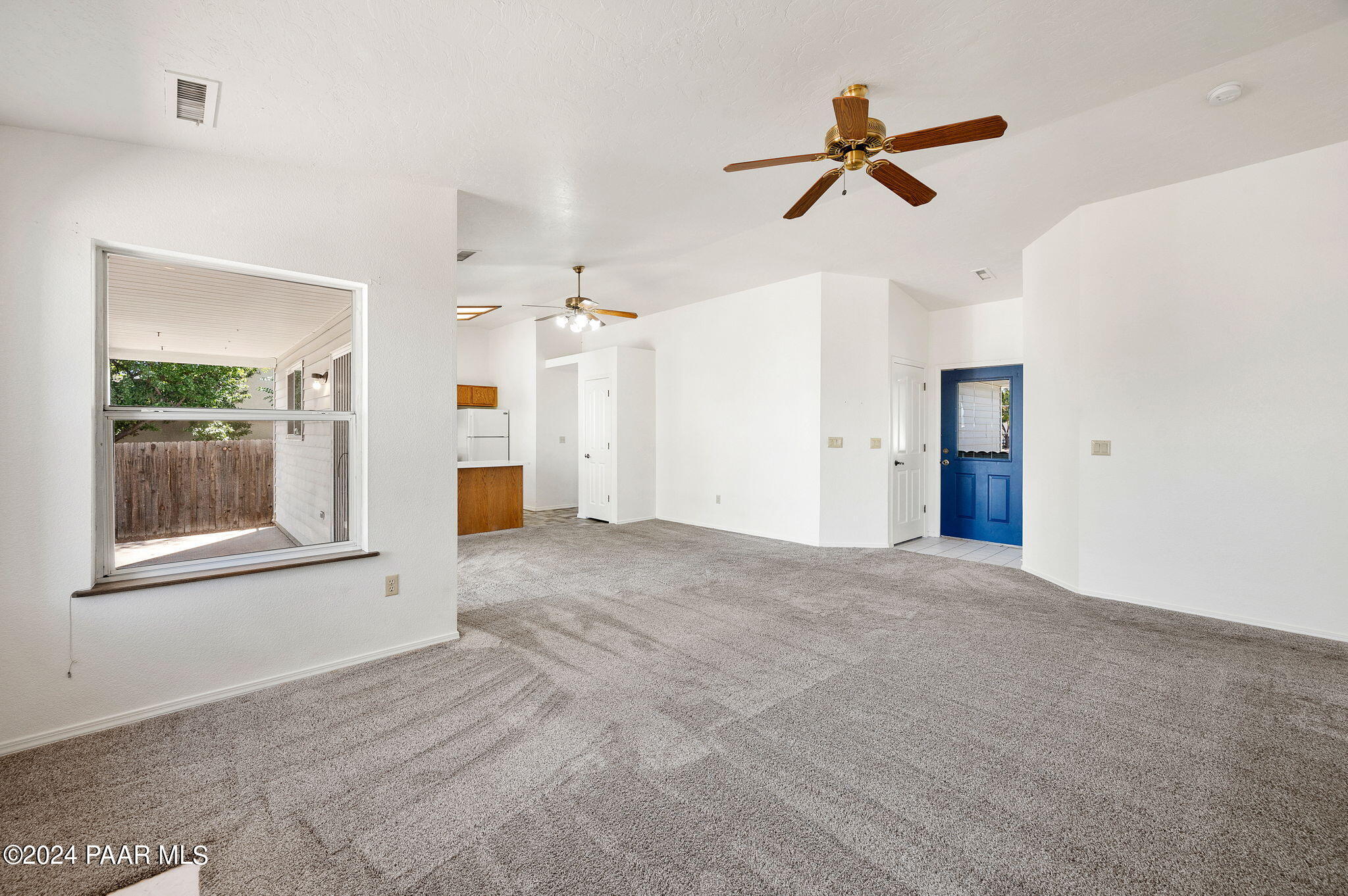 8128 East Gale Road Prescott Valley, AZ 86314 - Photo 8 of 38 a view of empty room with ceiling fan