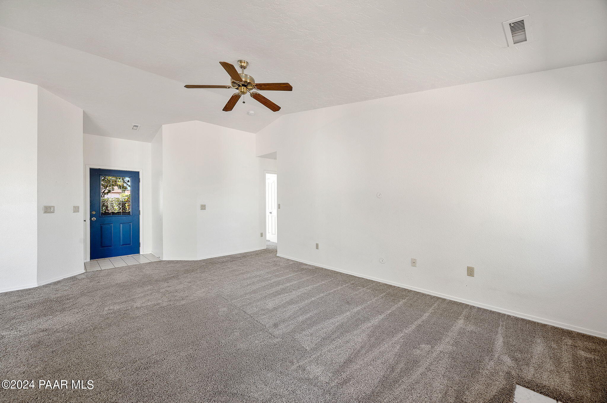 8128 East Gale Road Prescott Valley, AZ 86314 - Photo 9 of 38 a view of a room with a ceiling fan