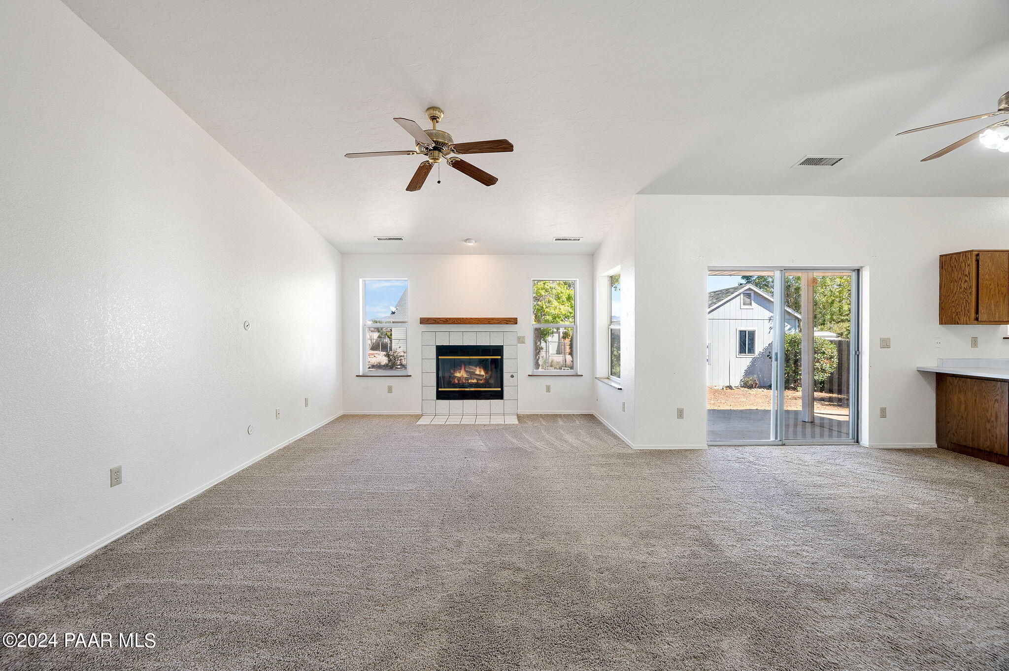 8128 East Gale Road Prescott Valley, AZ 86314 - Photo 10 of 38 a view of empty room with a fireplace