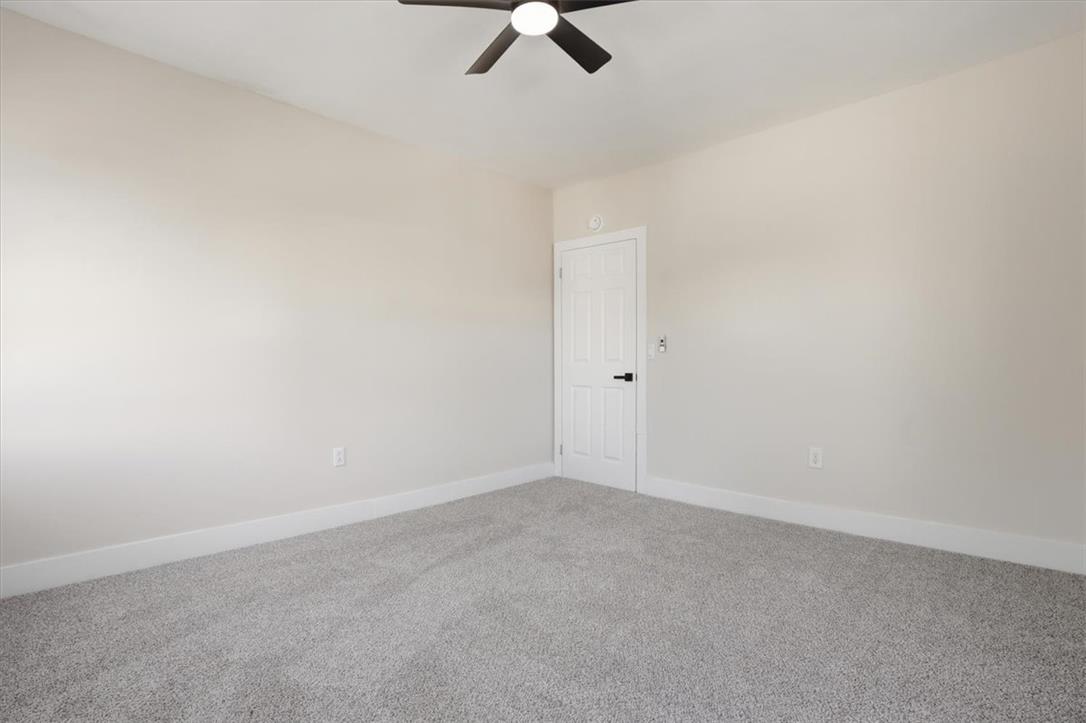 110 Messinger Street Bangor, PA 18013 - Photo 15 of 39 A spacious room offers plush carpet flooring and a modern ceiling fan for ultimate comfort.