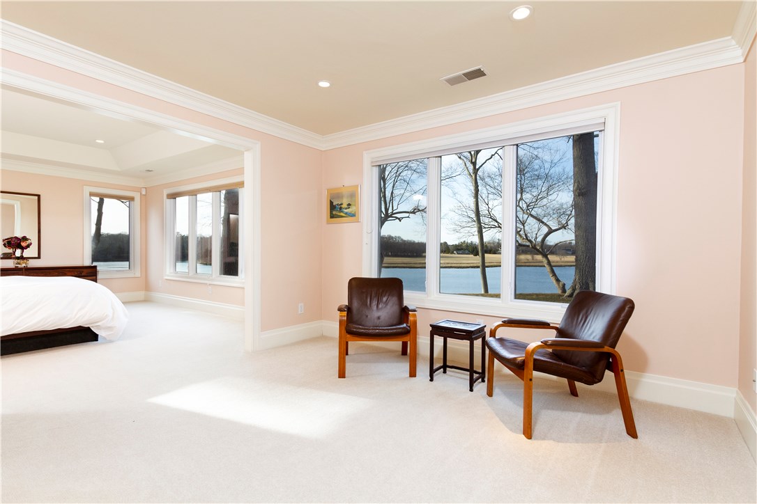 25 Pojac Point Road North Kingstown, RI 02852 - Photo 19 of 40 Enter the Master suite through french doors into a private sitting area.