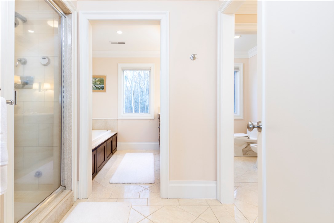 25 Pojac Point Road North Kingstown, RI 02852 - Photo 22 of 40 Luxuriate in the Master bath with steam shower, Jetted tub, double vanity, make-up vanity, and large walk-in closet!
