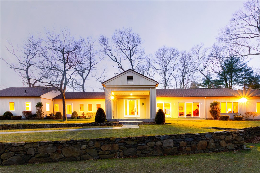 25 Pojac Point Road North Kingstown, RI 02852 - Photo 32 of 40 Tiered stone walls add dimension to the landscaping.