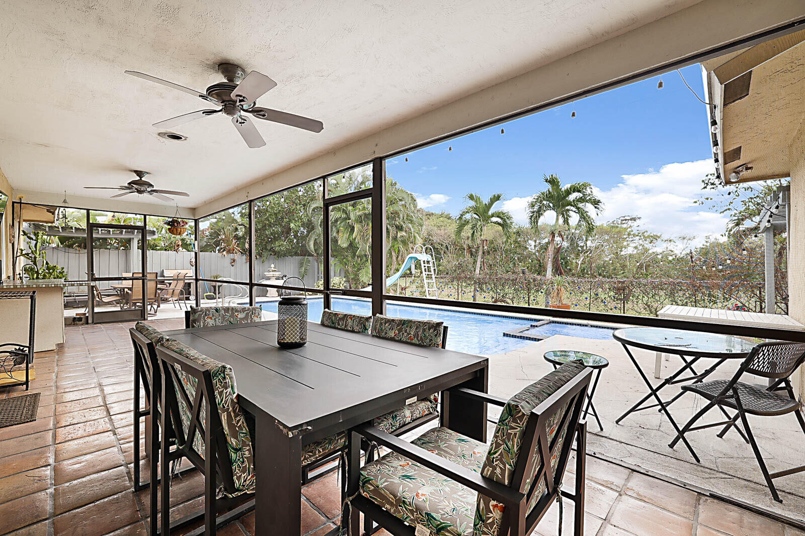 4422 Brandywine Drive Boca Raton, FL 33487 - Photo 14 of 18 a view of a dining room with furniture window and outside view