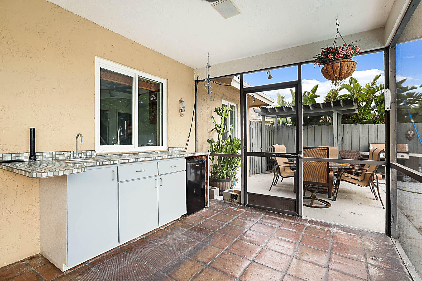4422 Brandywine Drive Boca Raton, FL 33487 - Photo 15 of 18 a view of a chairs and table in a patio