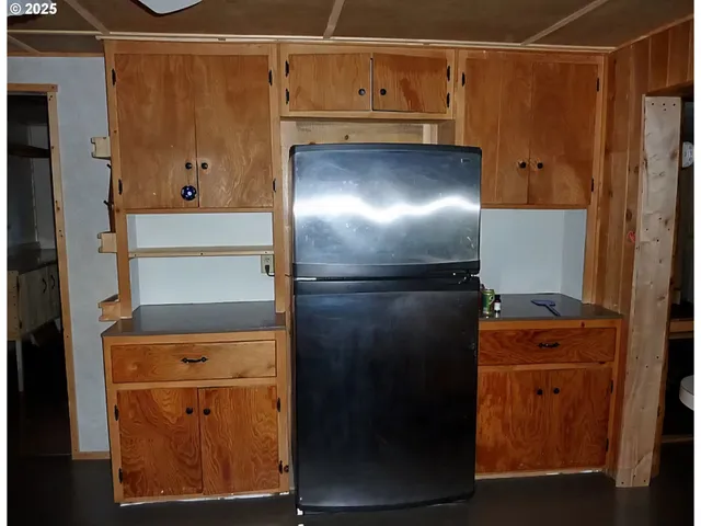 a living room with a fireplace furniture and a flat screen tv