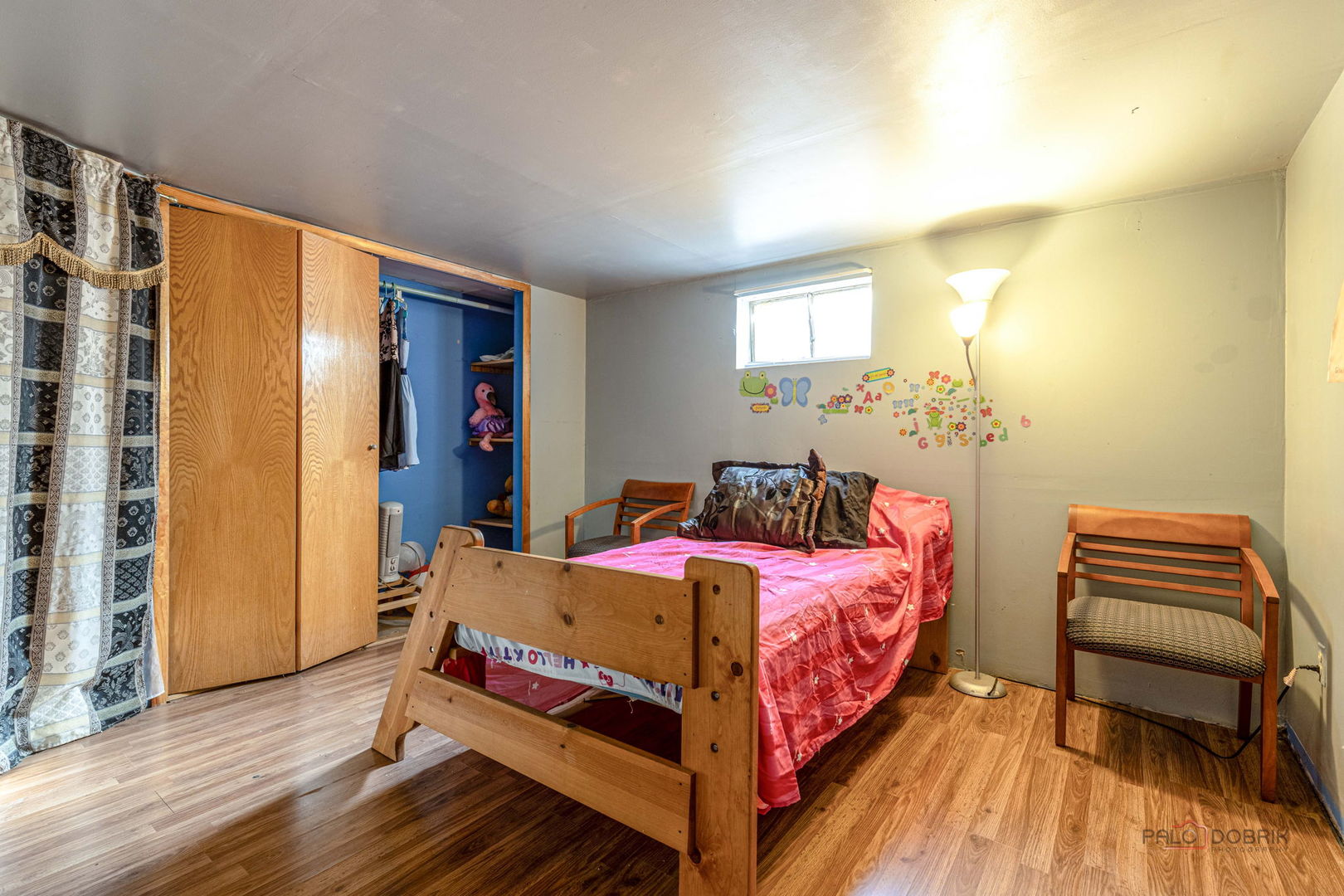 908 East Central Road Mount Prospect, IL 60056 - Photo 21 of 25 a bedroom with a bed and wooden floor