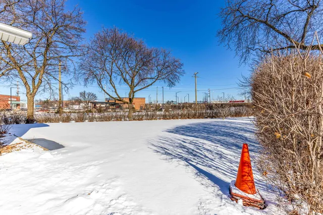 a view of road and covered with snow