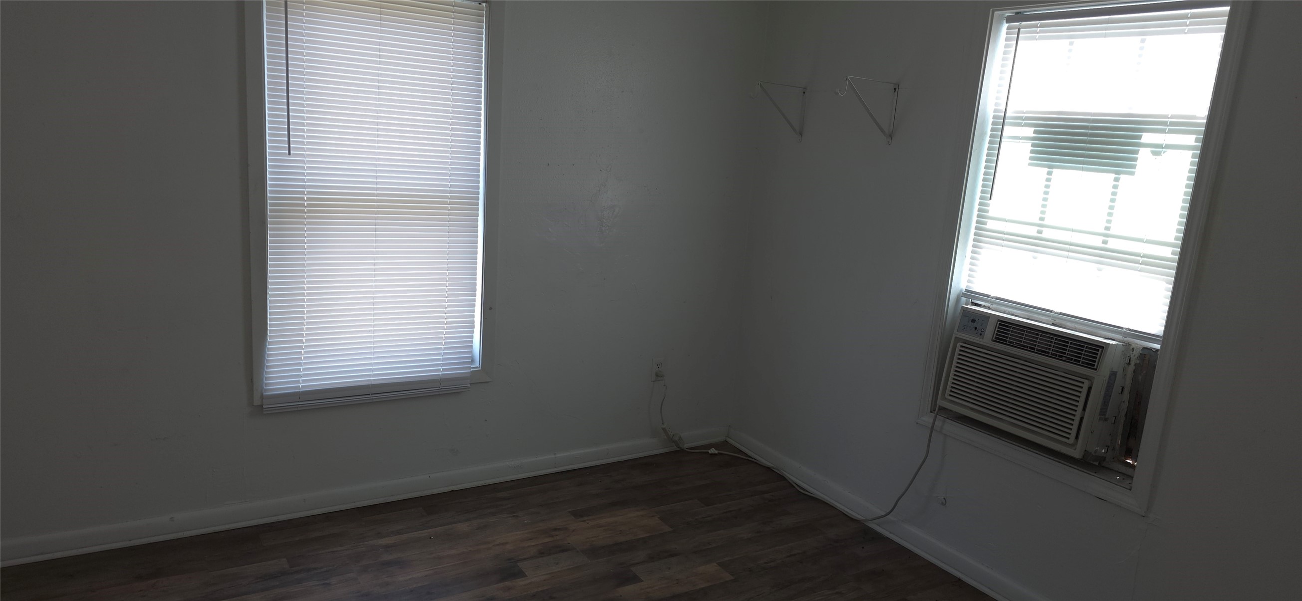 2811 Iola Street, Unit 8 Houston, TX 77017 - Photo 12 of 12 an empty room with wooden floor and a window
